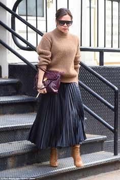 Stylish: The singer-turned-designer was effortlessly chic in her casual ensemble, teaming ... Skirt And Sweater, Vintage Clothing Stores, Chique Outfits