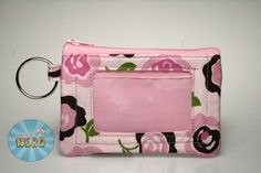 "This ID/coin purse features a pink floral pattern. It is lined with light pink cotton and has a vinyl ID window for a license or school ID. It would be perfect for any fan of pink! This mini wallet would be great to carry your money and cards without having to lug around a purse or giant wallet!  It's perfect to hold your school or work ID with a little bit of extra cash for that run to the vending machine halfway through the day. You'll always have what you need close by with this ID wallet. T School Id, Id Wallet, Brown Flowers, Travel Cards, Coin Purse Wallet, Pink Floral Pattern, Vending Machine, Mini Wallet, Money Clip Wallet