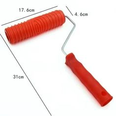 an orange plastic handle is shown with measurements