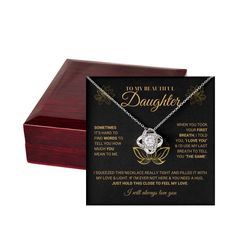 a wooden box with a necklace on it that says, may my child be the daughter