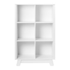 a white bookcase with four shelves on each side