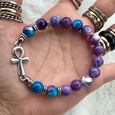 Boho /Bead / Beaded Bracelet /Gemstones / Genuine 8mm Purple Blue White Snowflake Jasper Gem Beads . Silver Plated Anhk Charm / Egyptian Cross / Key Of Life / Fits 6 To 7.5 Inch Wrist ( If You Need A Different Size Just Lmk ) Handmade By Me I Ship Fast! Any Questions Lmk ! Crystal / Gift / Stylish , Gems , Trendy , Bohemian / Elastic / Bohochic / Yoga / Mala Beads / Hippie / Colorfull Bracelets / Multi Colors Beads Spiritual Silver Beaded Gemstone Bracelets, Spiritual Silver Beaded Bracelets With Gemstones, Silver Bohemian Crystal Bracelet With 8mm Beads, Silver Beaded Bracelet With Lapis Lazuli And Natural Stones, Silver Lapis Lazuli Hand-strung Beaded Bracelets, Blue Amethyst Beaded Bracelets For Gift, Blue Amethyst Beaded Bracelets As Gift, Silver Lapis Lazuli Beaded Bracelets For Healing, Silver Beaded Lapis Lazuli Bracelets