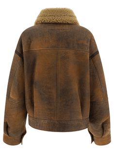 Expertly crafted from treated leather and warm merino shearling, this double-breasted jacket is perfect for chilly days. Its contrast shearling neckline and adjustable straps provide added comfort, while the relaxed fit and hip length ensure a stylish and versatile look. | Acne Studios Women's Leather Shearling Jacket in Brown | Size FR 38 | A70175700 Acne Studio, Fall Winter 2024, Outdoor Clothing, Leather Cap, Double Breasted Jacket, Brown Leather Jacket, Shearling Jacket, Sweaters Knitwear, Leather Jackets Women