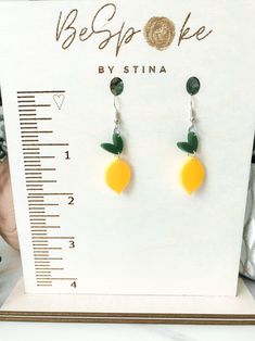 When life gives you lemons, pour a gin! Add some zest into your outfit with these lemon dangle earrings! Lemons often represent love, friendship, purification, and longevity. Size: 2 Inches Materials: Acrylic *Nickle Free ~~~ Yellow Fruit Design Earrings For Gift, Yellow Fruit Design Earrings Gift, Yellow Fruit Design Earrings As Gift, Handmade Lemon Color Dangle Jewelry, Frozen Lemon, Simple Tricks, Gin, Dangle Earrings, Thing 1