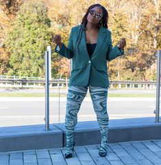 Make your wardrobe pop with this luxe blazer. Its a green material with an oversized fit and one button detailing. style this blazer with matching leggings and heels or boots for a look that is sure to get noticed this season. Model is wearing Large for the blazer and small for the leggings Please Note: due to the difference in lighting the items might look different Leggings And Heels, Green Blazer, Matching Leggings, Green Material, Jumpsuit, Make Your, Leggings, Blazer, Wardrobe