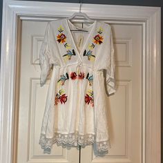 Nwt Women’s Impressions Embroidered Babydoll Dress Size Large. Never Worn. Comes From Pet Free/Smoke Free Home. Cute White Dress With Embroidered Hem, Cute Beach Dress With Floral Embroidery, White V-neck Dress With Floral Embroidery, Embroidered White Long Sleeve Mini Dress, White Embroidered Mini Dress For Brunch, White Long Sleeve Embroidered Mini Dress, White Embroidered Long Sleeve Mini Dress, Spring Beach Embroidered Dress With Lace Trim, Cute Embroidered White Dresses