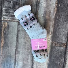 Stay cozy and warm with our Sherpa Soft and Cozy Socks. Made with a luxurious blend of polyester, acrylic, and spandex, these socks provide 7x's more warmth than traditional socks. Perfect for sizes 9-11, these socks offer extra warmth and comfort for your feet. Stay warm and comfortable all day long. Warm Thick Socks For Stocking Stuffers, Warm Snug Socks For Stocking Stuffer, Warm Cozy Fit Socks For Stocking Stuffers, Soft Gray Winter Socks, Warm Comfortable Socks For Cold Weather, Non-slip Winter Socks For Outdoor, Comfortable Warm Socks For Cold Weather, Snug Gray Winter Socks, Non-slip Socks For Outdoor Winter Activities