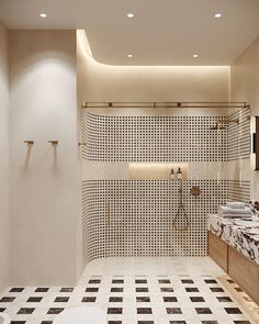 a bathroom with black and white checkered flooring, two sinks and a shower