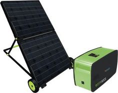 a green and black solar powered generator next to it's box on wheels,