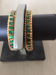 *This is Gold Finish Kundan Bangles Pair.Its Perfect for Wedding Occasion as well as Unique and Ethnic Traditional Bangle to gift and Also Bridal wear to match with Wedding Outfits. *Its made from Silver n Copper mix material and 100% Handmade. *Its available in Various Sizes like 2,2.2,2.4,2.6 Etc *Its open able Screwed Bangles Pair. *All Kundan stones set with silver foils handsetting method and long last guarantee of its workmanship.It is White Kundan Stones like pictures. *Also Available in Wedding Jeweled Bangle, Gold Bangle With Jewels For Weddings, Gold Jeweled Bangle For Wedding, Traditional Jeweled Bracelets For Parties, Handmade Gold Bridal Sets For Wedding, Gold Wedding Bangle With Jewels, Green Bracelet Jewelry For Wedding, Green Wedding Bracelet Jewelry, Elegant Handmade Wedding Bangle