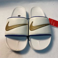 Nike Offcourt Slide New And Never Used Off White With Muted Gold Swoosh And Blue Sole Ynf 14511, 14510, 14509, 14508 (8) Comfortable White Nike Slides, White Sports Slides With Cushioned Footbed, White Cushioned Slides For Sports, Nike White Synthetic Slides, White Low-top Sporty Slides, Sporty White Slides For Sports, White Slide Sneakers With Cushioned Footbed, White Slip-on Sports Slides, White Cushioned Slide Sneakers