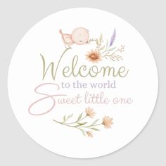 a welcome sticker with flowers and birds