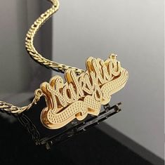 18K Gold Filled Nameplate Necklace, Custom Necklace, Double Plated Name Plate, Personalized Nameplate Necklace, Custom Jewelry Gift for Her . . . . . . . . . . . . . . . . . . . . . . . . . . . . . . . . .  * Product Description ♡ :  Introducing our exquisite 18K Gold Filled Nameplate Necklace, a stunning piece of custom jewelry that beautifully combines elegance with personalization. This Custom Necklace is the perfect gift for her, allowing you to create a meaningful and cherished accessory th Betty Boop Jewelry, Personalized Nameplate Necklace, Insta Model, Name Plate Necklace, Extra Long Necklace, Nameplate Necklace, Plate Necklace, Custom Necklace, Perfect Gift For Her