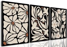 three panels with flowers and leaves on them