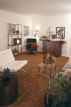 the living room is clean and ready for guests to use it as a work space