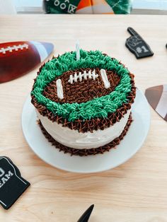 a football themed cake on a table