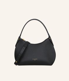 Black, a timeless color and always an excellent choice for effortless morning style.
Our black handbag is carefully handcrafted in our workshops in Italy, using the finest grained calf leather, complemented by refined gold finishes. Whether carried by hand or on the shoulder with its additional strap, this bag is a perfect complement to any look. Its secure zipper opens to a beige interior, offering ample and elegant space for your essentials. Timeless Hobo Bag With Gold-tone Hardware, Luxury Everyday Shoulder Bag With Round Handle, Timeless Formal Hobo Bag With Detachable Strap, Classic Shoulder Bag With Adjustable Strap In Saffiano Leather, Timeless Luxury Bag With Detachable Strap, Classic Office Hobo Bag With Gold-tone Hardware, Timeless Everyday Shoulder Bag With Smooth Grain, Timeless Shoulder Bag With Detachable Strap, Timeless Formal Hobo Bag With Gold-tone Hardware