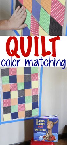 a child's hand holding up a quilt made out of colored squares and blocks