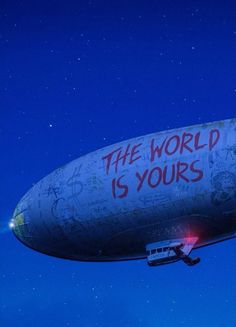 an air plane with the words the world is yours written on it