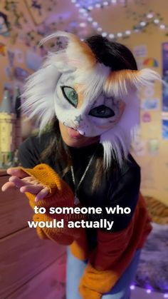 a person wearing a cat mask with the caption to someone who would actually be