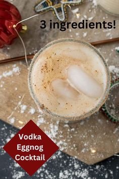 an eggnog cocktail is garnished with sugar