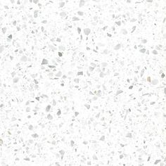 a white and gray speckled surface with small dots