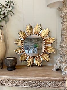 Measures 16 inches in diameter  Actual mirror is 7.75 inches in diameter  Free shipping Items will be wrapped securely for protection.  Handcrafted Peruvian mohena wood sunburst mirror with gold leaf finish and antiquing glaze. Use alone or in a gallery. It has a hook on the back for hanging on the wall. Spanish Mirror, Mirror Gallery, Boho Mirror, Sun Mirror, Spanish Decor, Hallway Mirror, Antiquing Glaze, Christmas Tours, Unique Mirrors