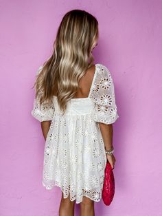 Be the epitome of summer with our State Of Mind Large Eyelet Babydoll Dress! This white floral dress features a square neckline and sheer sleeves, giving it a feminine and breezy look. Perfect for any occasion, it's the perfect addition to your wardrobe. Lined Square neckline Sheer sleeves with elastic cuffs Back zipper closure Fit: Relaxed; No stretch Bust: Small-32in Medium-34in Large-36in Length: Small-33in Medium-34in Large-35in Fabric: 50% Cotton 50% Polyester Wash Instructions: Dry clean M Feminine Square Neck Mini Dress For Beach, Lace Mini Dress With Square Neck For Brunch, Summer Lace Dress With Straight Neckline, Summer Lace Mini Dress With Straight Neckline, Cute Square Neck Mini Dress For Summer, Cute Summer Mini Dress With Square Neck, Summer Dresses With Lace Trim And Straight Neckline, Cute Square Neck Summer Mini Dress, Lace Mini Dress With Straight Neckline For Summer