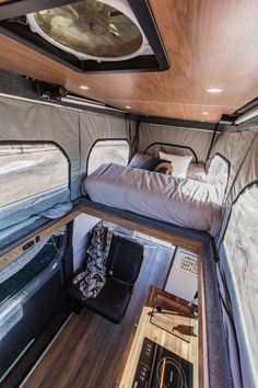 the interior of a camper with bunk beds