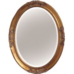 an ornate gold framed mirror on a white background