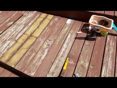 the tools are laying on the wooden deck