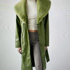 New W/O Price Tag Is An Overstock Outlet (Has Black Line Going Thru Cloth Label Name To Prevent Store Return) Authentic Uo Coat - Finn Faux Fur & Faux Leather Trench Coat - Olive Green - Size Small; Measures Approx. 18" Flat From Pit To Pit, 18" Sleeves From Underarm, 41" Length - Timeless Trench Coat From Uo Made Modern With A Faux Leather Finish Plus Luxe Faux Fur At The Collar. Longline Silhouette In A Relaxed Fit With An Oversized Collar, Button Placket At The Front And A Tied Belt At The Wa Winter Single Breasted Faux Leather Outerwear, Winter Single-breasted Faux Leather Outerwear, Fitted Green Outerwear For Fall, Winter Faux Leather Outerwear With Lapel Collar, Faux Leather Lapel Collar Outerwear For Winter, Green Collared Fall Outerwear, Winter Faux Leather Long Coat, Collared Green Outerwear For Fall, Fitted Faux Leather Long Coat