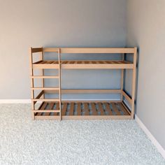 a wooden bunk bed sitting in the corner of a room