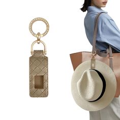 a woman is holding a purse and a hat