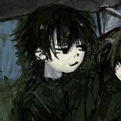 two young men with black hair are looking at something