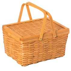 a wicker picnic basket with handles on an isolated white background for text or image