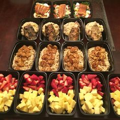 trays filled with different types of food on top of a table