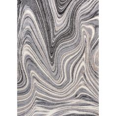 an abstract rug with black and white swirls on the side, in grey tones