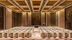 an empty banquet hall with tables and chairs