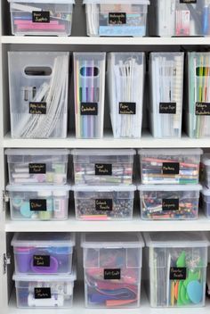 the shelves are filled with lots of crafting supplies and storage bins for organizing