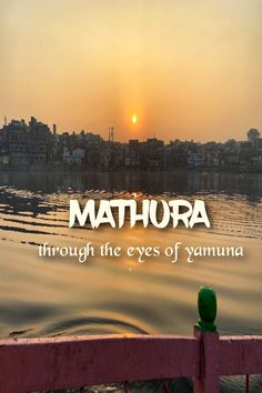 the sun is setting over some water and there is a quote on it that says, mathura through the eyes of yamun