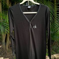 Black Calvin Klein Nightgown Pajama Size Large. Never Worn; Tags On. Soft, Light Weight Cotton Material. Black Long Sleeve Sleep Top, Black Long Sleeve Sleepwear For Lounging, Black Long Sleeve Nightgown For Loungewear, Black V-neck Sleepwear For Lounging, Casual Black Nightgown, Casual Black Nightgown For Sleepover, Black Long Sleeve Nightgown For Bedtime, Black Long Sleeve Nightgown, Calvin Klein Long Sleeve Tops For Loungewear