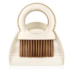 the brush holder is made out of white plastic