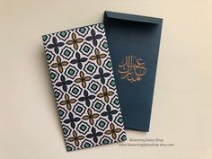 two cards with arabic writing on them