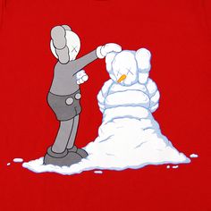 a red t - shirt with an image of a cartoon character making a snowman