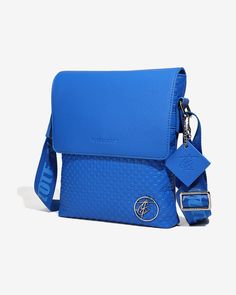 Stay organized and stylish with our Blue Bodega Crossbody Messenger Bag. This sleek bag features multiple compartments to keep all your essentials in place. Enjoy hands-free convenience with the comfortable crossbody design. Upgrade your everyday look with this versatile and functional bag. Versatile Blue Mobile Phone Bag, Functional Blue Shoulder Bag With Mobile Phone Holder, Functional Blue Bag With Zipper Closure, Modern Blue Bag With Zipper Pocket, Functional Blue Crossbody Shoulder Bag, Modern Blue Bag With Zipper Closure, Modern Blue Bags With Zipper Closure, Functional Blue Bag With Adjustable Strap, Versatile Blue Bags With Adjustable Strap