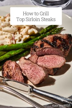 steak, asparagus and macaroni on a plate with the words how to grill top sirlon steaks