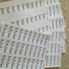 several pieces of paper with words written on them sitting on the floor next to each other