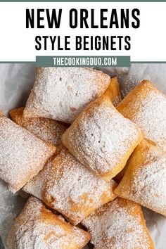 a pile of powdered sugar filled pastries on top of a white plate with text overlay