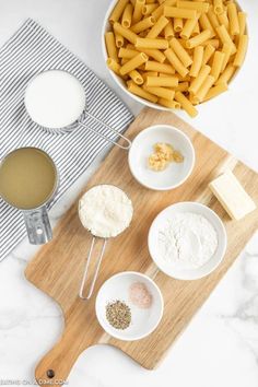 the ingredients to make pasta are displayed in bowls